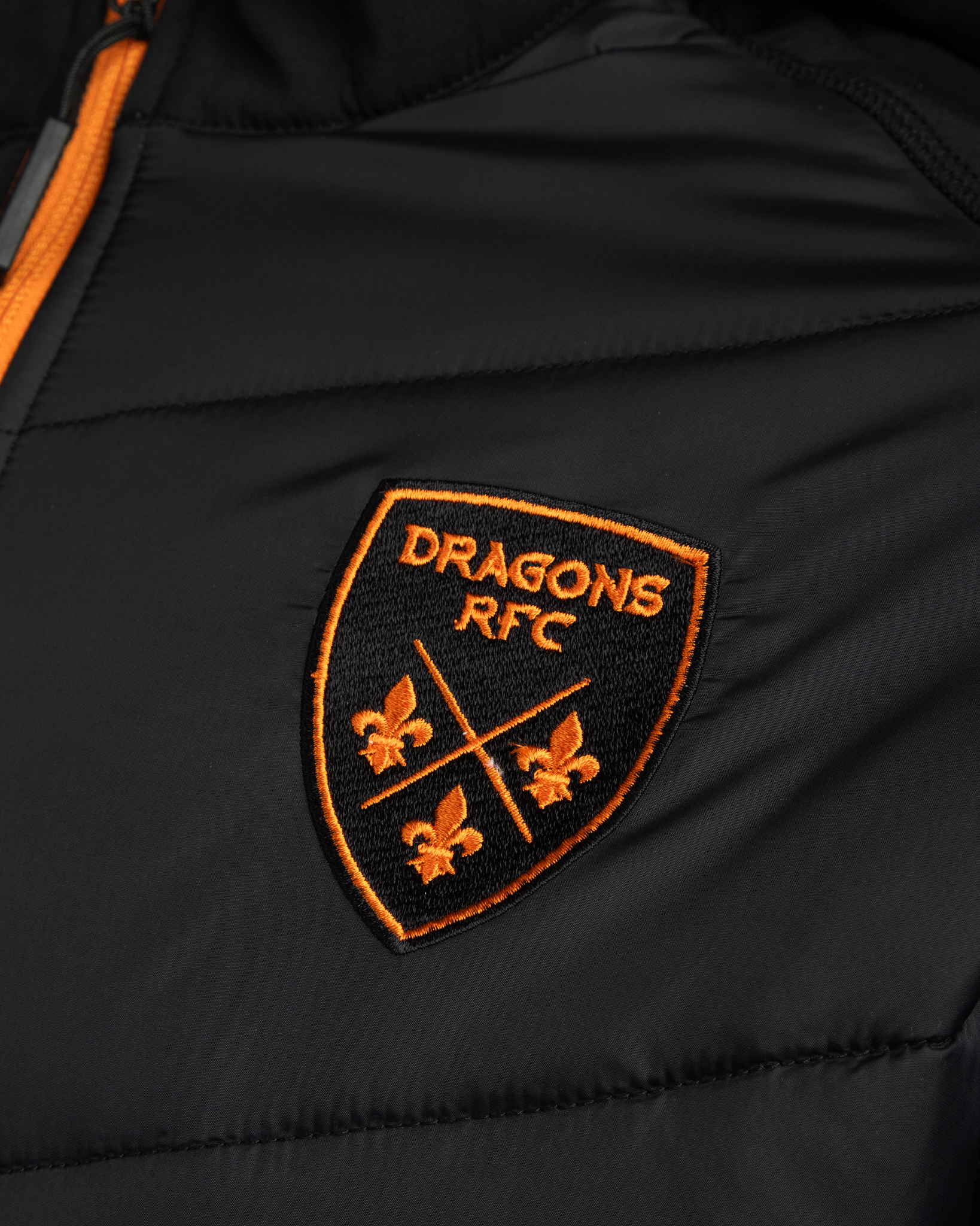 Dragons RFC 25/26 Tempest Hybrid Jacket 	Black/Bright Orange
